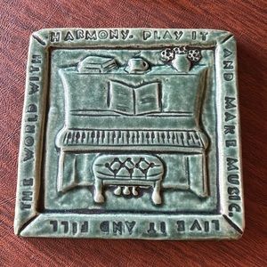 Sara Frank Iguanaworks inc. handmade tile. Green glazed ceramic Piano design
